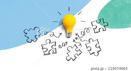 Jigsaw puzzle with a yellow light bulb 118074665