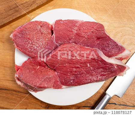 Pieces of raw thick beef steaks Pieces of raw thick beef steaks 118078127