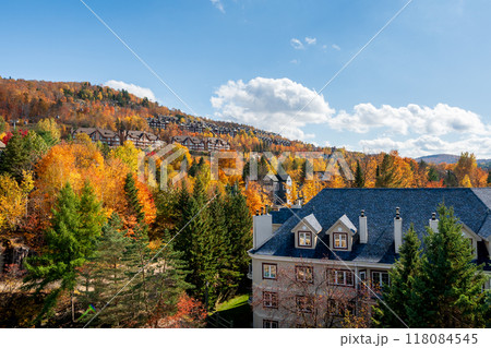 Mont Tremblant Ski Resort in autumn. Beautiful maples scenery in the Laurentians. Mont-Tremblant, Quebec, Canada. Mont Tremblant Ski Resort in autumn. Beautiful maples scenery in the Laurentians. Mont-Tremblant, Quebec, Canada. 118084545