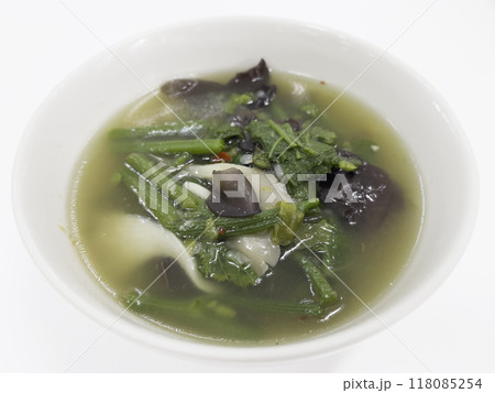 Home made kitchen bowl of soup with whole and sliced mushrooms 118085254