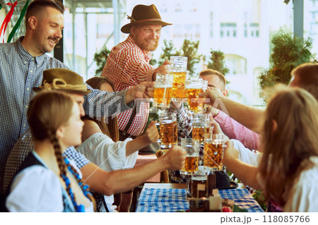Cheers. Happy, smiling, joyful people,friends gathering at bar, clinking glasses in celebratory toast, enjoying positive meeting Cheers. Happy, smiling, joyful people,friends gathering at bar, clinking glasses in celebratory toast, enjoying positive meeting 118085766