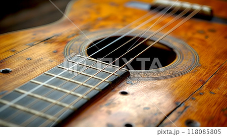 Closeup wooden acoustic guitar, top view for part of neck and body with wooden top 118085805