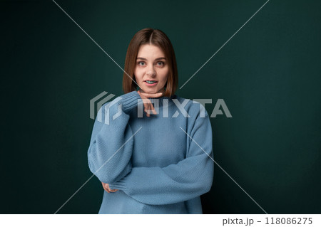 Woman in Blue Sweater Poses for Picture 118086275