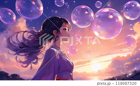 夕焼け空に舞うショボン玉を見つめる少女 118087320
