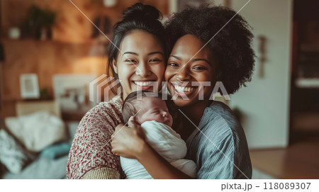 Happy mothers holding their newborn baby at home Happy mothers holding their newborn baby at home 118089307
