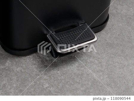 Close-Up of Pedal Bin Foot Mechanism on Grey Floor Close-Up of Pedal Bin Foot Mechanism on Grey Floor 118090544