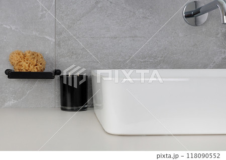 Minimalist Bathroom Sink with Sponge and Candle Minimalist Bathroom Sink with Sponge and Candle 118090552