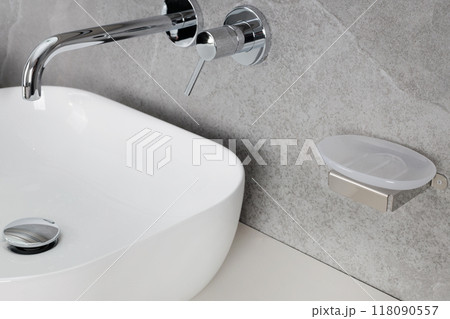 Minimalist Bathroom with Empty Soap Dish and Chrome Faucet Minimalist Bathroom with Empty Soap Dish and Chrome Faucet 118090557