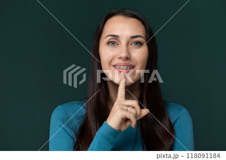 Woman Making a Hush Gesture 118091184