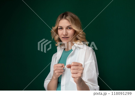 Woman in White Shirt Holding Piece of Paper Woman in White Shirt Holding Piece of Paper 118091299