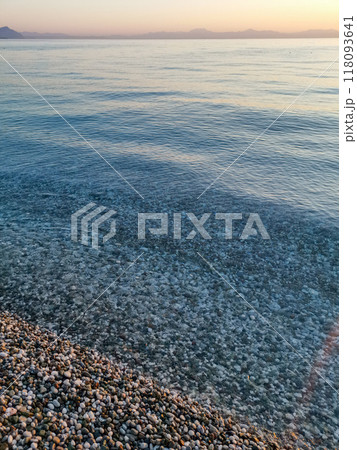 The ocean is calm and the water is clear The ocean is calm and the water is clear 118093641