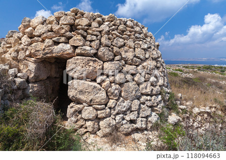 An old abandoned ruined stone hut located in Mellieha, Malta An old abandoned ruined stone hut located in Mellieha, Malta 118094663