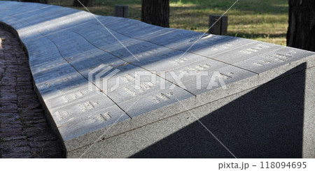 Kiev, Ukraine September 12, 2020: Memorial in the Bykivnyansky forest near Kiev, where thousands of Polish officers were shot by the NKVD in 1940 Kiev, Ukraine September 12, 2020: Memorial in the Bykivnyansky forest near Kiev, where thousands of Polish officers were shot by the NKVD in 1940 118094695