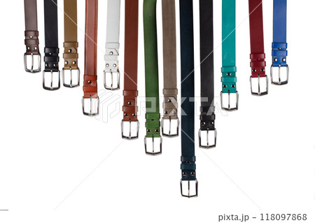 View of various multi-colored leather belts with buckles. Isolated on white background 118097868