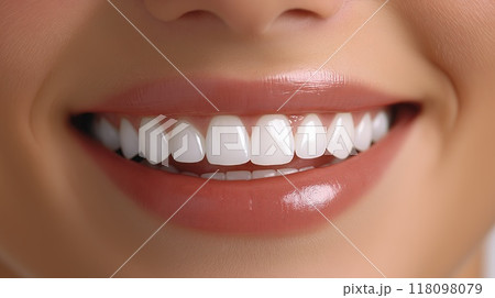 Close up of a smiling young woman's teeth. Dentistry concept. Close up of a smiling young woman's teeth. Dentistry concept. 118098079