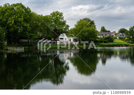 Aachen, Germany, July 26, 2024 - Natural reflections of the Diepenbenden water pond 118098939