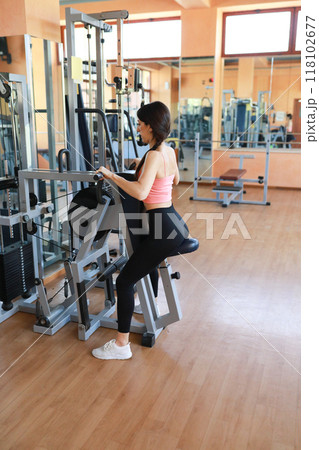 Fit Woman On A Usual Day In The Gym  118102677