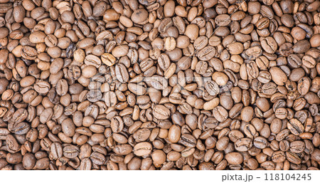 Roasted coffee beans as a background. Coffee, cheerfulness web size. Roasted coffee beans as a background. Coffee, cheerfulness web size. 118104245