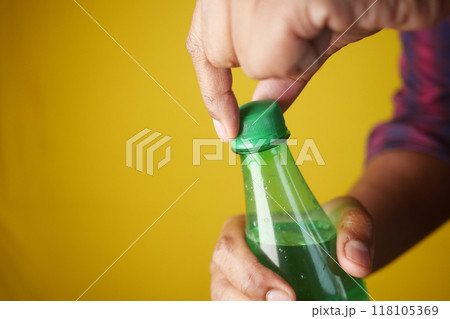 Opening a sealed Green Bottle can be exciting, especially when seeking a refreshing drink 118105369