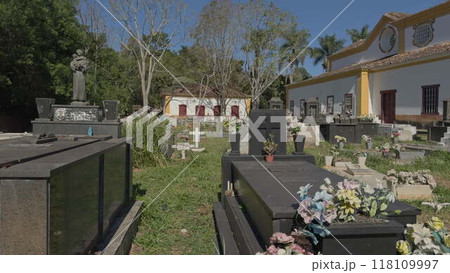 Walking through a Brazilian colonial cemetery with tombstones Walking through a Brazilian colonial cemetery with tombstones 118109997