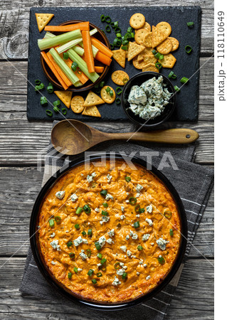hot buffalo chicken dip in baking dish, top view hot buffalo chicken dip in baking dish, top view 118110649