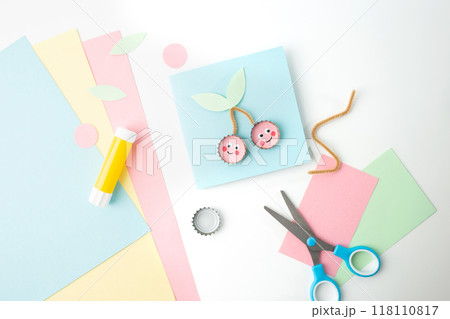 a pair of scissors sitting on top of a pile of paper, a pastel, card template, cherry, miniature product photo, circle, scrapbook 118110817