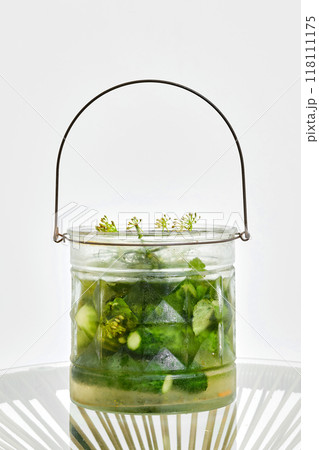 Jar with pickled cucumbers Jar with pickled cucumbers 118111175