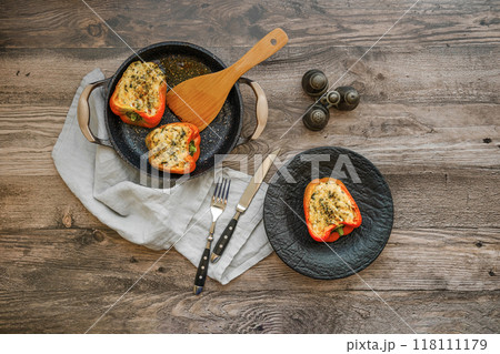 Overhead view of roasted bell peppers stuffed with goat cheese and mozzarella Overhead view of roasted bell peppers stuffed with goat cheese and mozzarella 118111179
