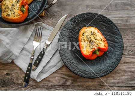 Close-up view of roasted goat cheese stuffed bell peppers 118111180