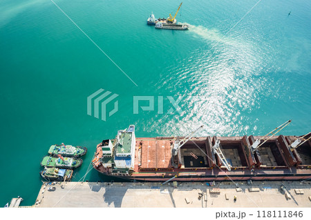 Aerial view of Harbor Cargo ship carrying container.Container ship Aerial view of business logistic import and export in the harbor Aerial view of Harbor Cargo ship carrying container.Container ship Aerial view of business logistic import and export in the harbor 118111846