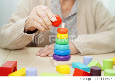 Asian elderly woman playing game. Asian elderly woman playing game. 118113607
