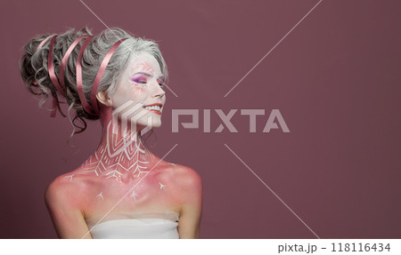 Excited beautiful woman in carnival Halloween costume, theater actress Excited beautiful woman in carnival Halloween costume, theater actress 118116434