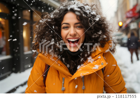 Portrait of a girl on a city street in winter 118117555