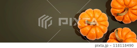 Autumn orange pumpkins overhead view 118118490
