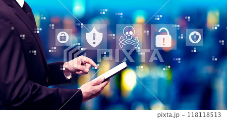 Virus and scam theme with businessman using a tablet computer 118118513