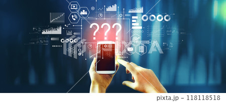 Question marks with person using smartphone Question marks with person using smartphone 118118518