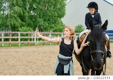 Capturing Moments During Horseback Riding Training Session Capturing Moments During Horseback Riding Training Session 118122533