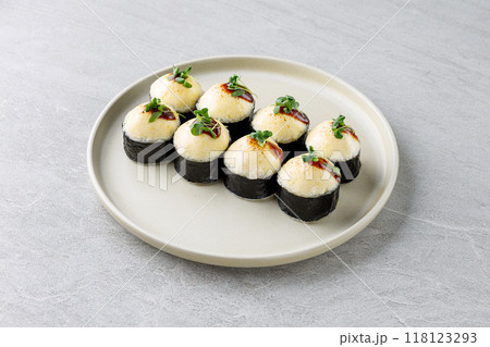 delicious fresh baked sushi roll with crab mayonnaise Philadelphia cheese. delicious fresh baked sushi roll with crab mayonnaise Philadelphia cheese. 118123293