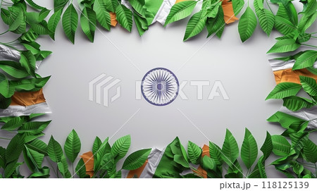 India Independence Day Celebration with Indian Flag Colors and Ashoka Chakra Surrounded by Green Leaves 118125139