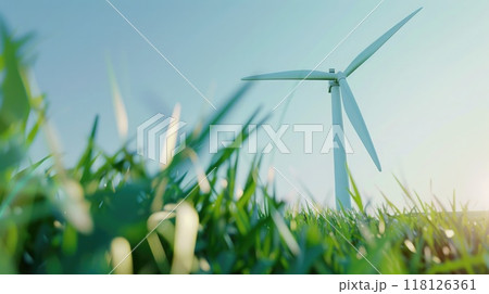 Clear blue sky and lush grass in Dutch windmill park, close-up of single turbine with sunlight catching white blades. Windmill park clean energy nehterlands 118126361
