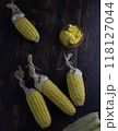 corn cobs in dark wooden background. 118127044
