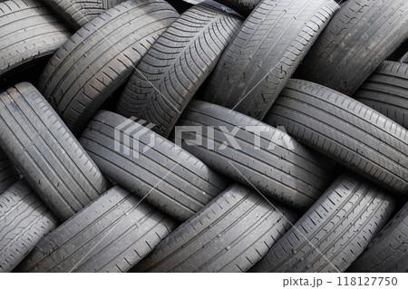 Background of Stack of used car tires waiting to be recycled Background of Stack of used car tires waiting to be recycled 118127750
