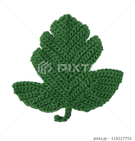 Knitted green monstera leaf isolated on a white background. 118127753