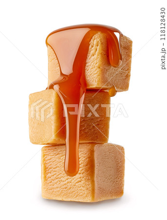 stack of sweet caramel candies stack of sweet caramel candies 118128430