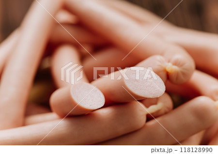 Stack of sausages on a plate, perfect for food presentations, cooking visuals, and menu designs 118128990
