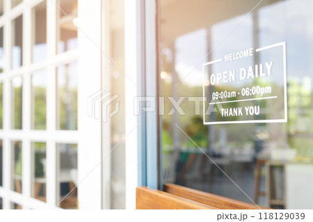 Welcome open sign on shop door. Text on cafe front or restaurant hang on door at entrance. vintage tone style. banner. 118129039