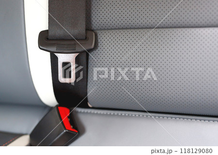 Close Up of fastening seat safety belt in car for before driving on the road. concept transport travel safety. soft focus. Close Up of fastening seat safety belt in car for before driving on the road. concept transport travel safety. soft focus. 118129080