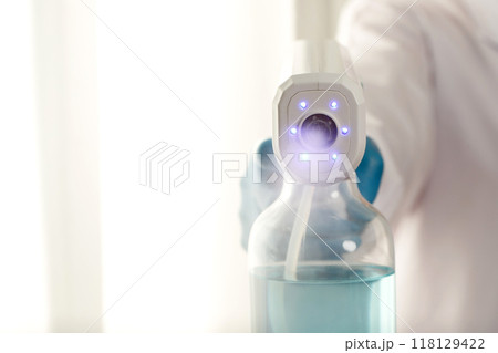 Liquid and alcohol spray to kill COVID-19 germs Liquid and alcohol spray to kill COVID-19 germs 118129422