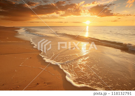 Golden sunset over vibrant sandy beach with waves Golden sunset over vibrant sandy beach with waves 118132791