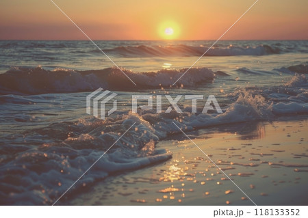 Close up of ocean wave at sunset with colorful sky 118133352